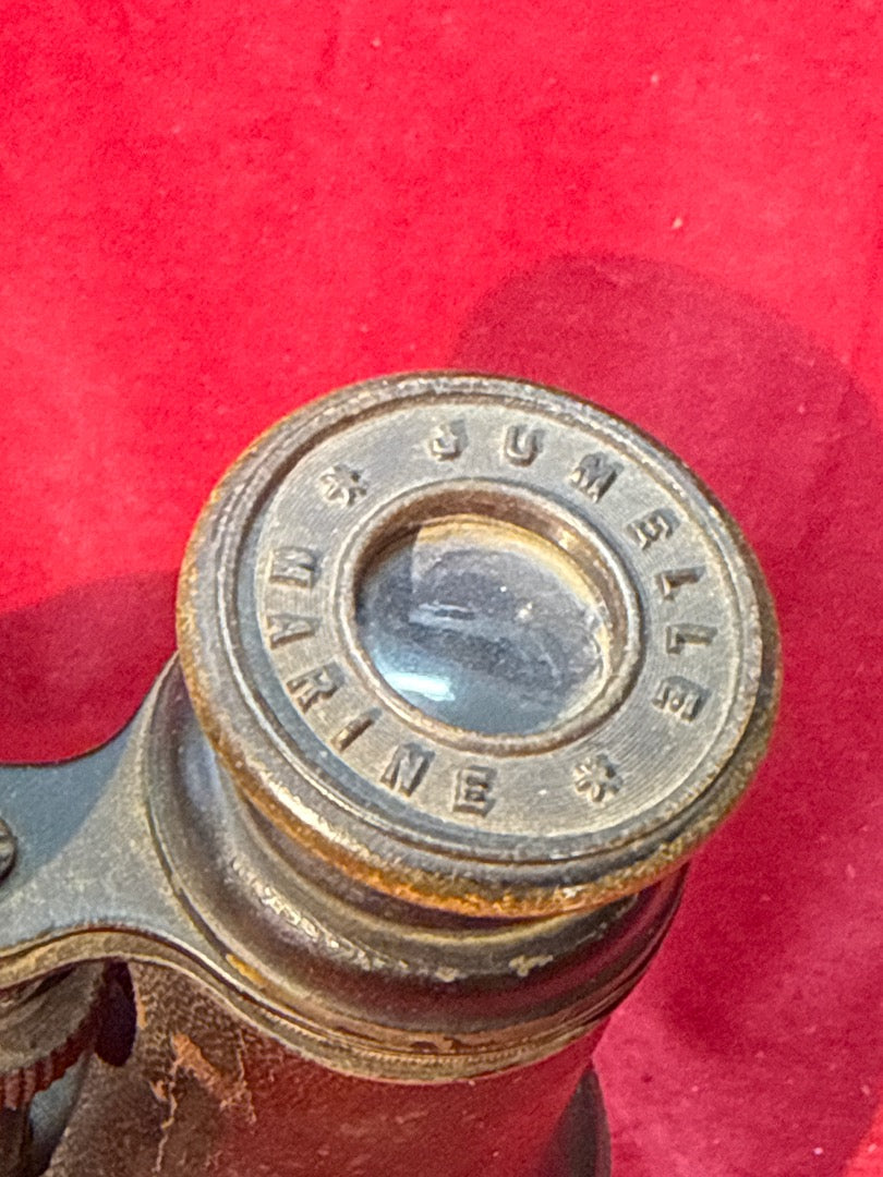 Jumelle marine ancienne en laiton gainée de cuir