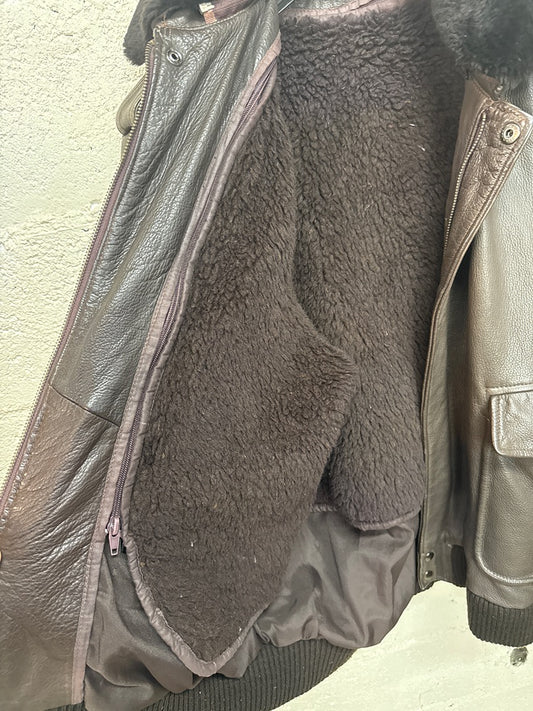 Blouson en cuir marron vintage col fourrure