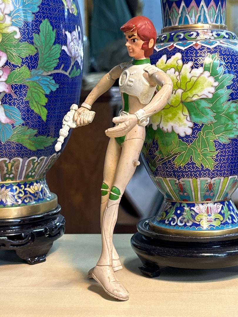 Figurine vintage Capitaine Flam personnage de dessin animé espace blanc vert