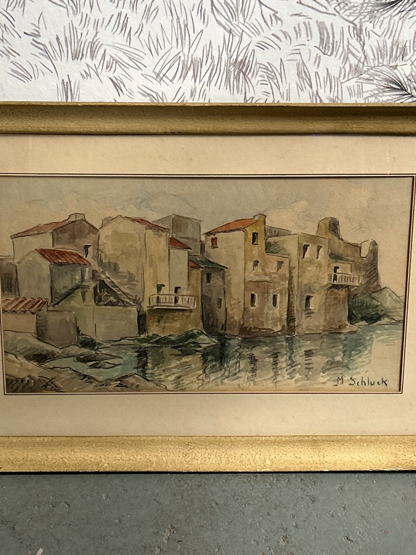 Aquarelle représentant des habitations signée M. Schluck