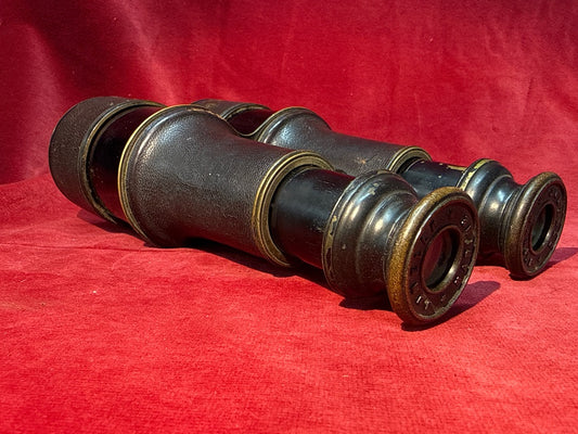 Jumelle marine ancienne en laiton gainée de cuir