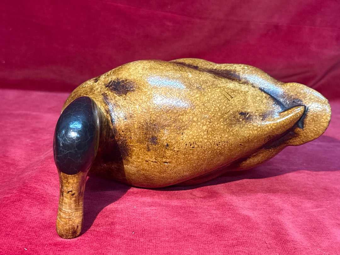 Canard sculpté et peint