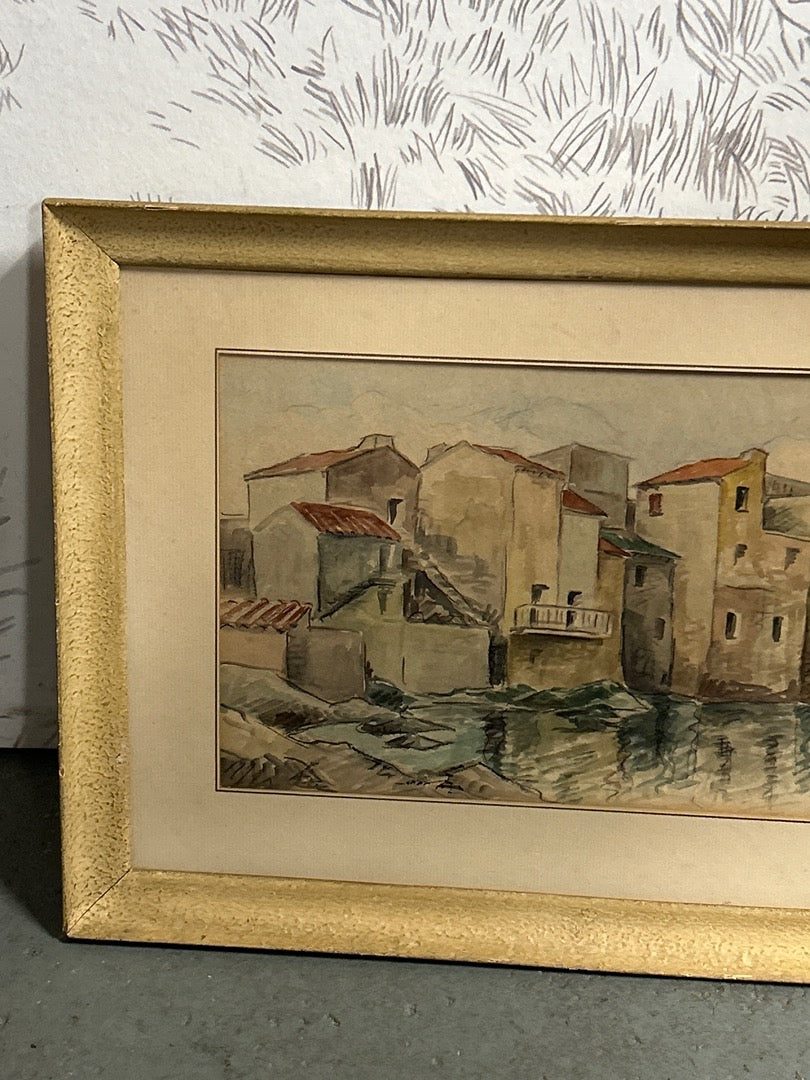 Aquarelle représentant des habitations signée M. Schluck