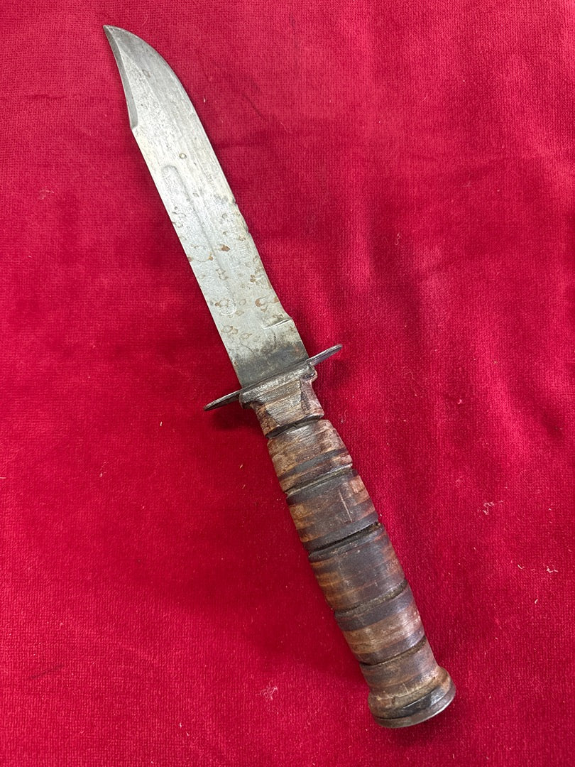 Couteau de combat militaire – Lame acier et manche cuir