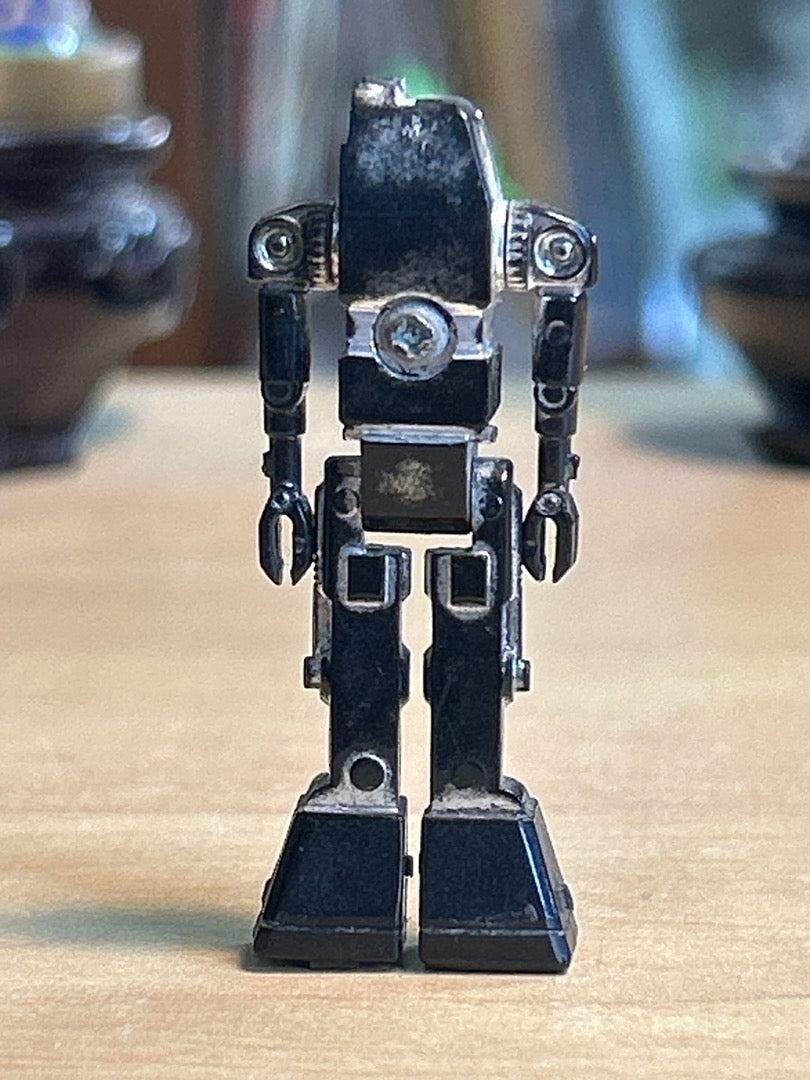 Figurine robot miniature vintage plastique argenté noir