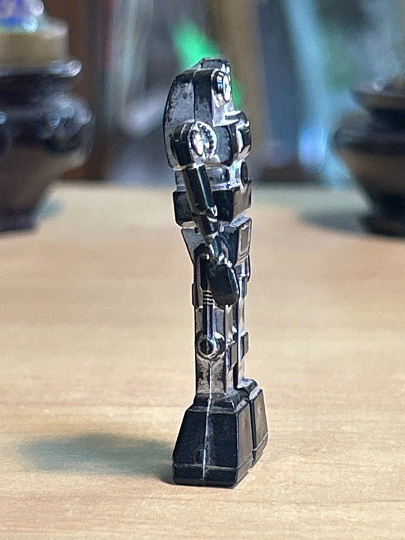Figurine robot miniature vintage plastique argenté noir