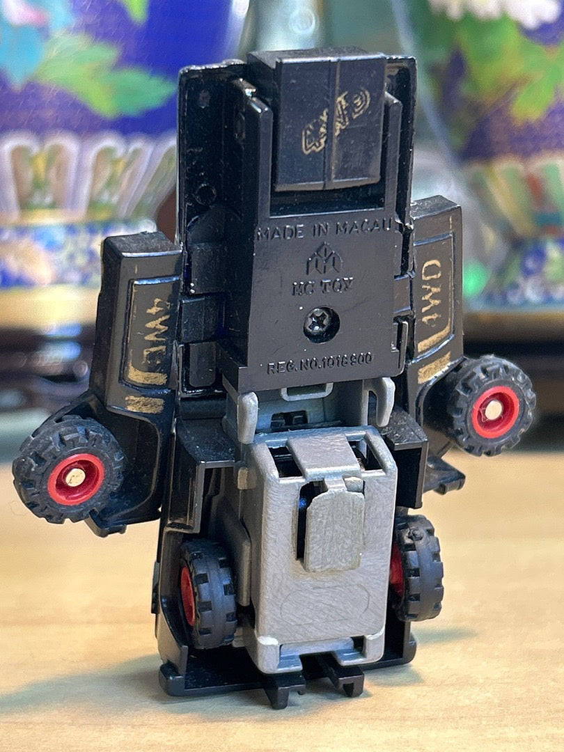 Figurine robot transformable vintage Mc Toy Made in Macau Moto Bot