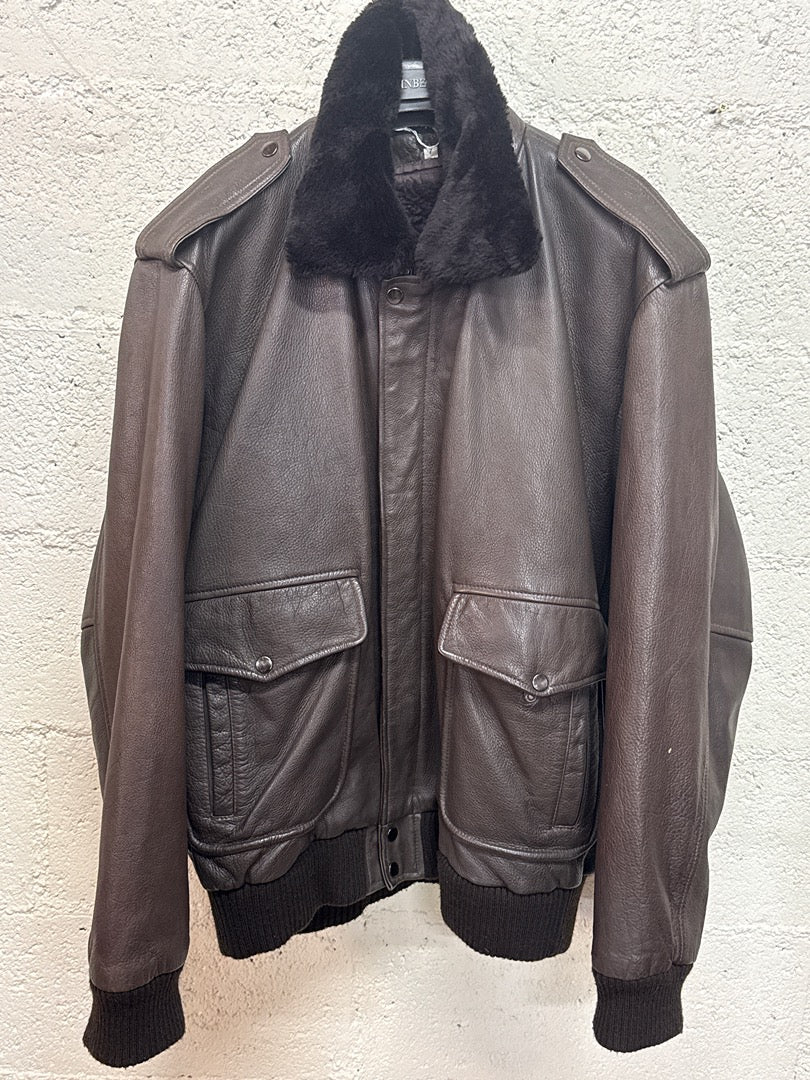 Blouson en cuir marron vintage col fourrure