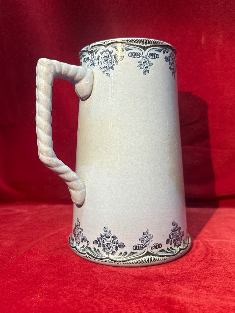 Ancien pichet en céramique décor floral