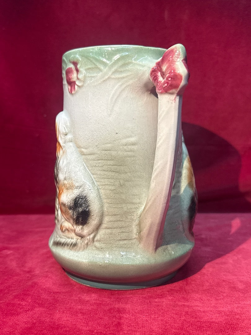Pichet en céramique barbotine motif chien
