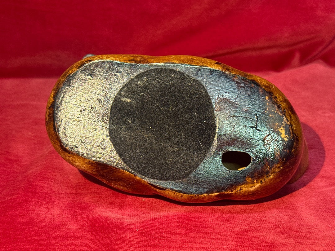 Canard sculpté et peint