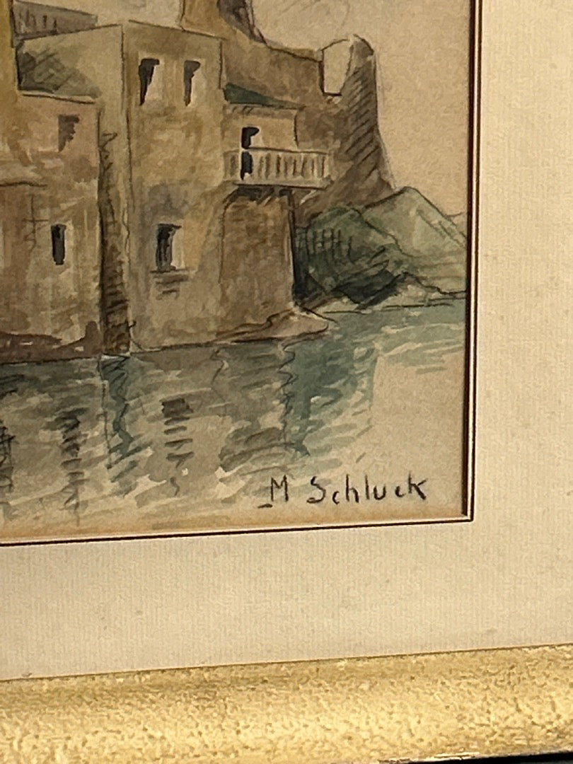 Aquarelle représentant des habitations signée M. Schluck