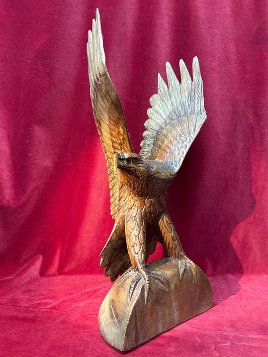 Grande statuette aigle en bois sculpté