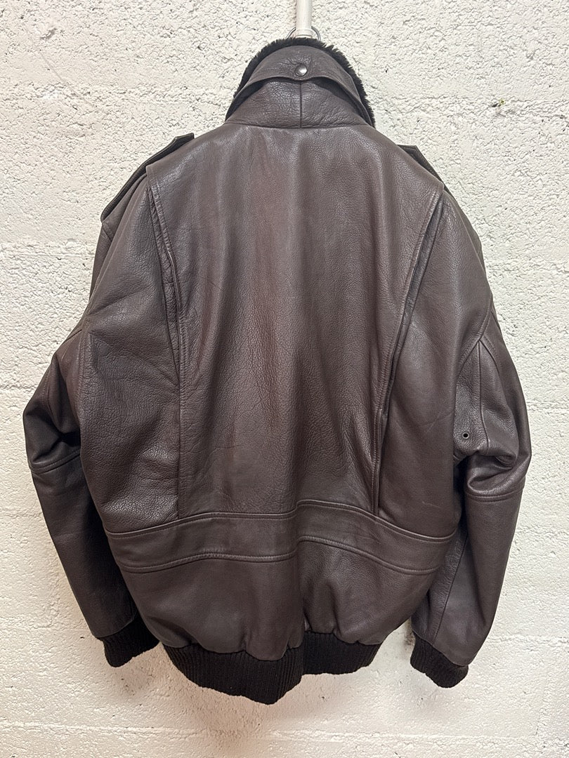 Blouson en cuir marron vintage col fourrure