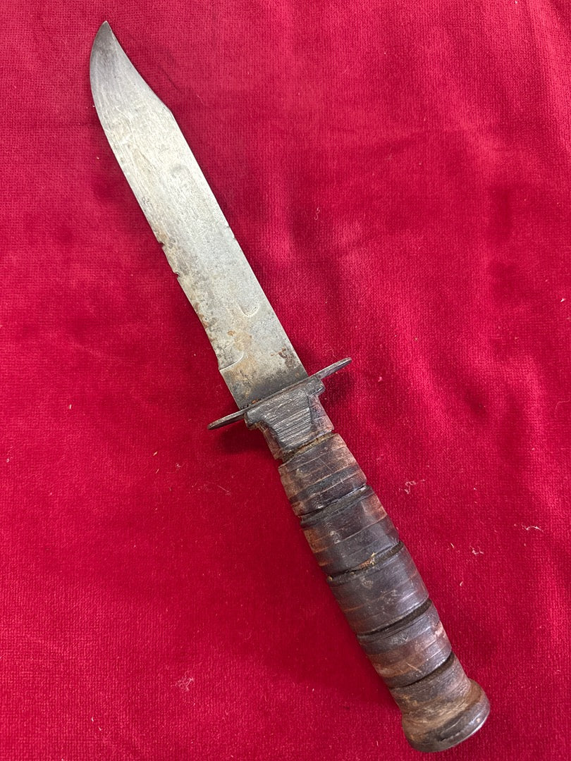 Couteau de combat militaire – Lame acier et manche cuir