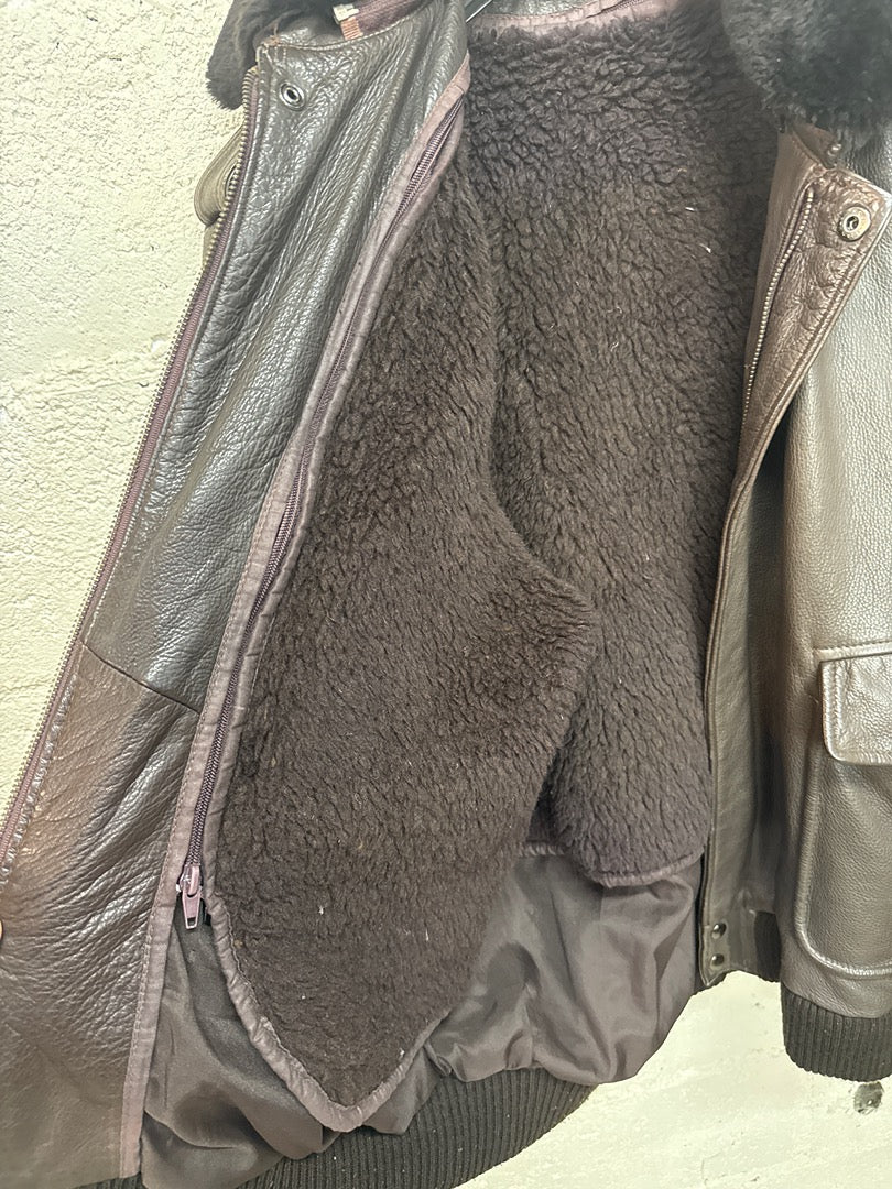 Blouson en cuir marron vintage col fourrure