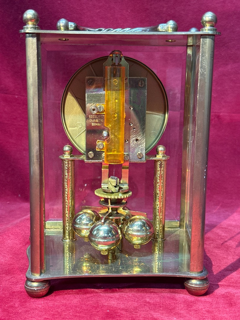 Pendule cage Haller mouvement mécanique bronze et verre