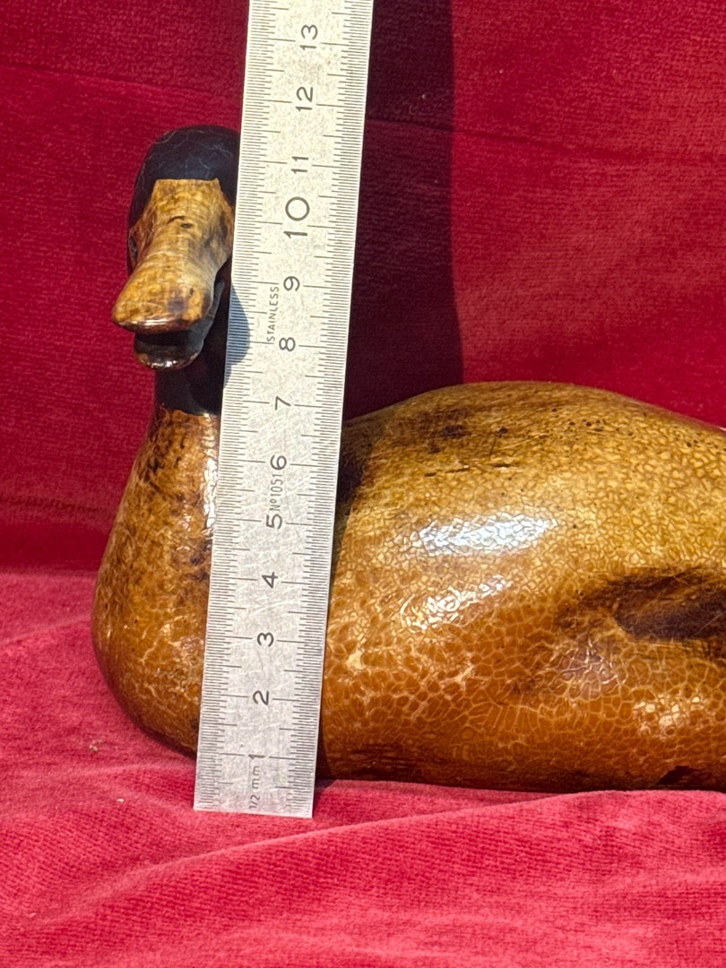 Canard sculpté et peint