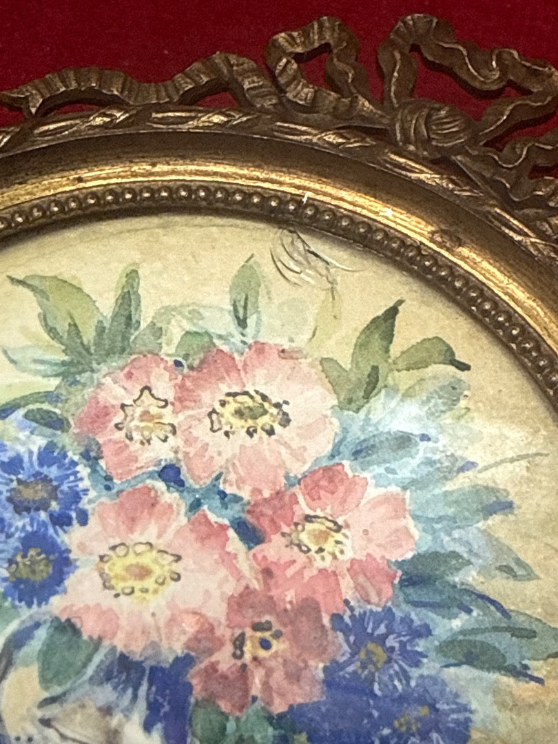 Petit cadre photo rond en laiton style Louis Xvi