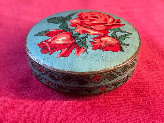 Boîte ronde de confiserie en métal bleu à décor de roses, 13 cm