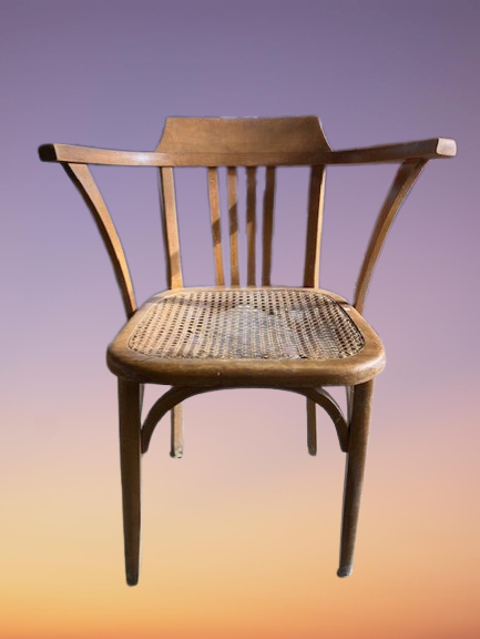 Fauteuil Vintage canné de la marque "Stella". Armature bois et cannage