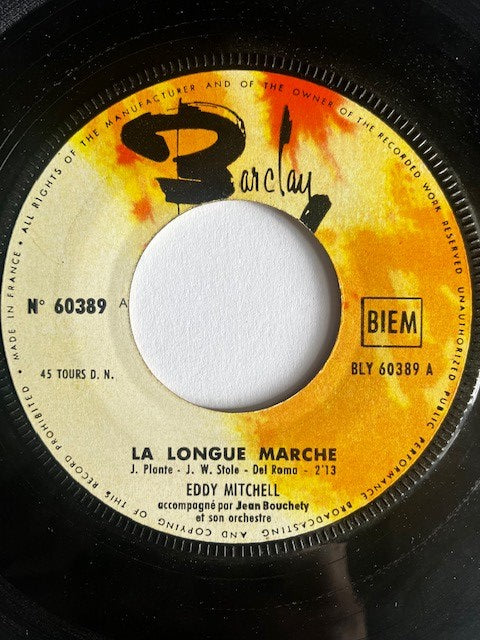 SP Eddy Mitchell La Longue Marche - En Revenant 